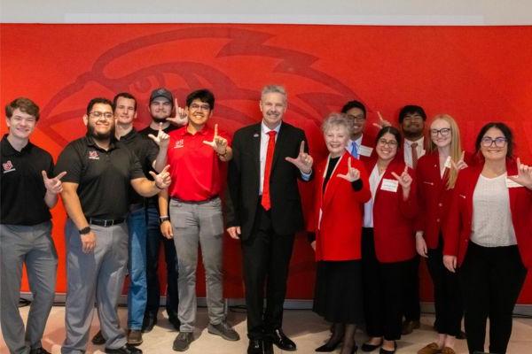 Carol Keating with Dr. Taylor and Students at Press Conference